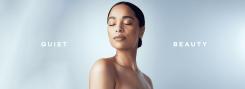 Mulher de pele radiante com expressão serena, representando o conceito de Quiet Beauty e o impacto das tecnologias estéticas modernas.