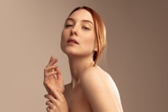 Portrait,Of,Young,Beautiful,Red-haired,Girl,Isolated,Over,Grey,Studio